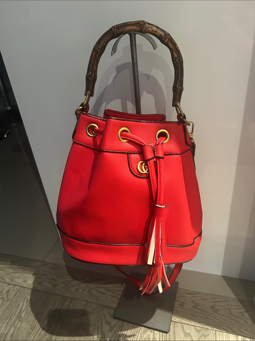 Red Leather Bucket Shoulder Bag with Bamboo-Style Handle